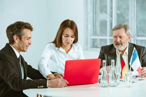 The business people working together at table. The meeting or summit concept